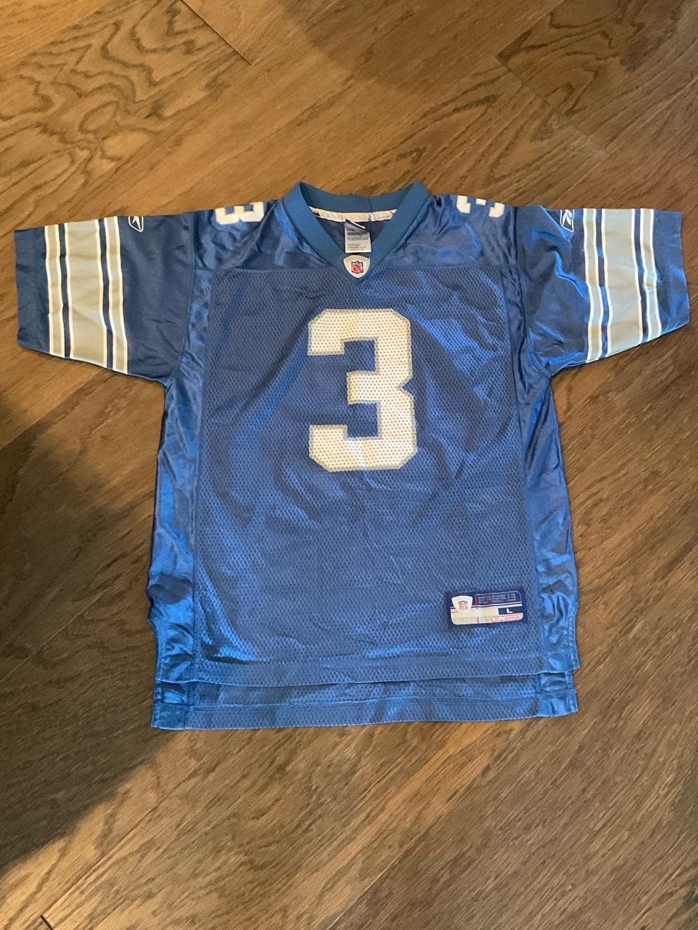 Detroit Lions Reebok NFL Football Jersey 
PLayer:Joey Harrington #3 
SIze: Youth
